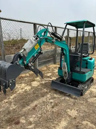 DitchIt | Mini Excavator With Thumb Auger and Breaker Attachment ...