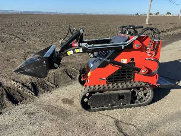 DitchIt | New Mini Skid Steer on Tracks Auger Breaker Forks available