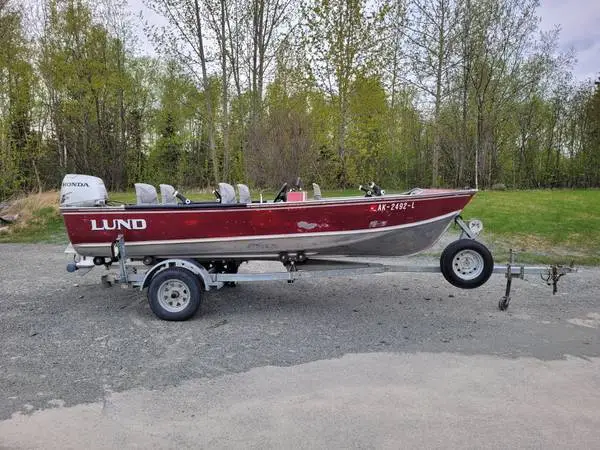 Boat Lund WS-16 with 50 HP Honda Motor on EZ Load Trailer