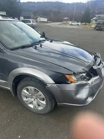 2009 Subaru Outback designated a total