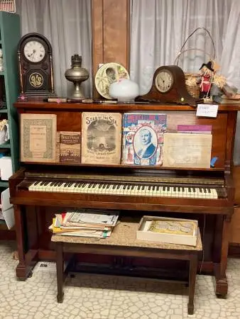 House packed with vintage items, vintage clothing, and fine antiques