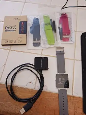 Garmin Watch, charger, and screen covers
