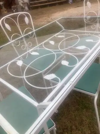 Wrought iron table and 4 chairs