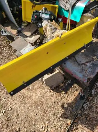 John Deere Snow Blade 46 inch and chains $100