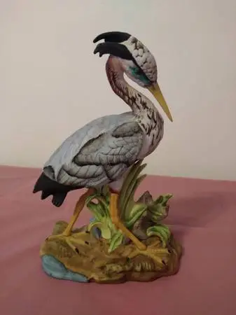 VINTAGE POTTERY CRANE $12; MARBLE DOVES $4