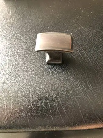 1 1/4 knobs dark bronze 50 cents each knobs cabinet hardware