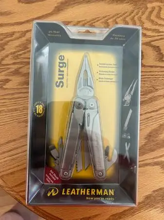 LEATHERMAN MULTI TOOL NEW IN PACKAGE MINT TITANIUM COATED
