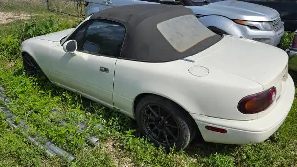 Set of 4 Wheels with tires for a 1995 Mazda Miata