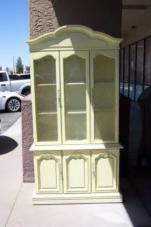 Yellow Bernhardt china cabinet / china hutch