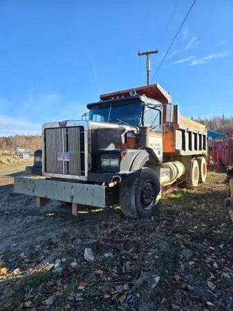 Running, working Dump Truck