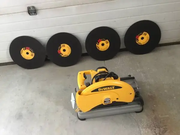 14” Dewalt Cut Off Saw With Four Extra  Blades