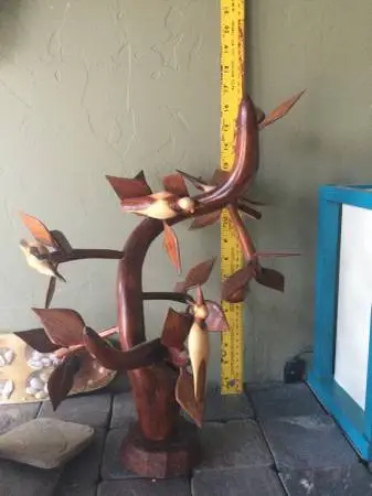 Folk art carved humming bird carving
