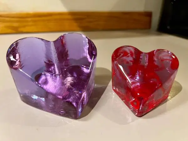 Pair of Fire and Light recycled glass paperweights
