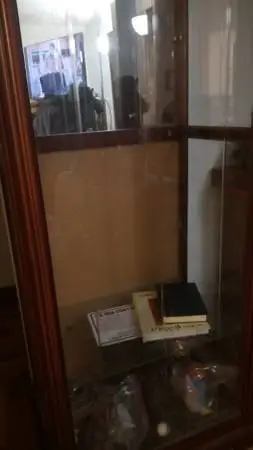 Beautiful Curio Cabinet free got damage when moved.