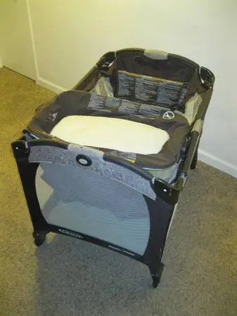 Graco Pack n Play with Bassinet & 2 Sheets - $50 OBO (Cheyenne)