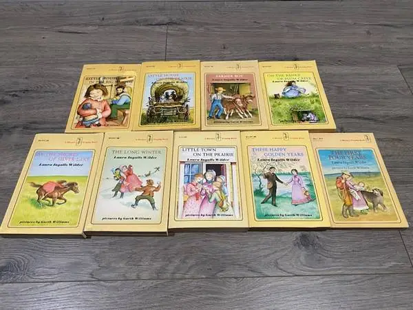 LITTLE HOUSE ON THE PRAIRIE 9 PAPERBACK BOOKS by Laura Ingalls Wilder