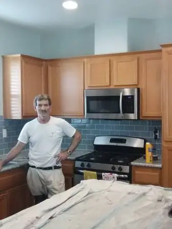 Kitchen cabinet spray painting repairing flood repair free estimate