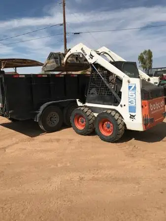 Bobcat Loader Excavator Yard Work Cleanup Spreading Digging Grading