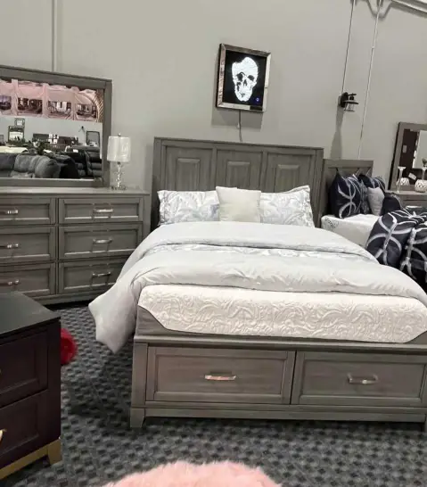 Grey wooden queen bed with drawers