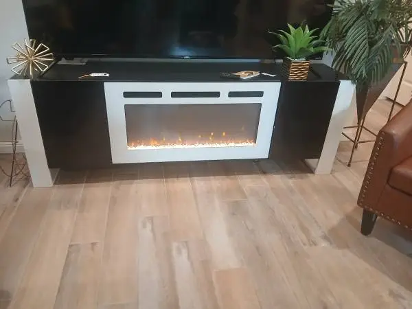 70 inch tv cabinet has heater heats up 200 sft