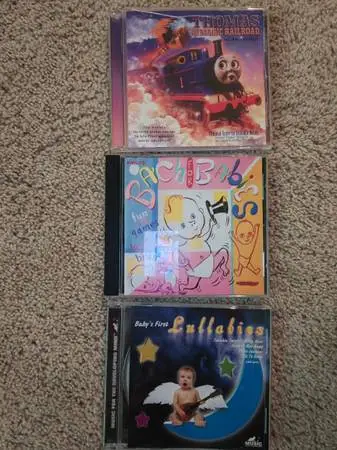 kids/babies CDs (Thomas the Tank Engine, lullabies, Bach), play well