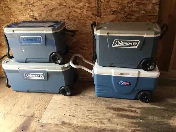 FISHING SEASON-\Four High End Coleman Wheeled Coolers.