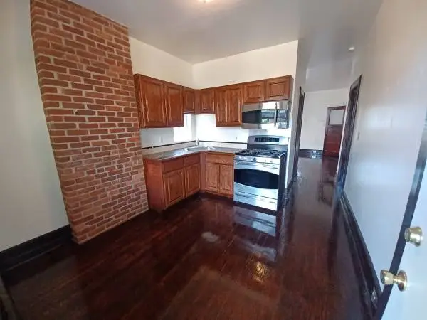Newly remodeled 2BR +?3 apartment in the brick house.