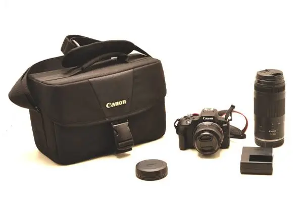 CANON R100 MIRROR LESS W/18-45MM AND 75-300MM