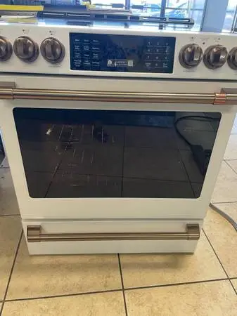 GE white matte induction electric range