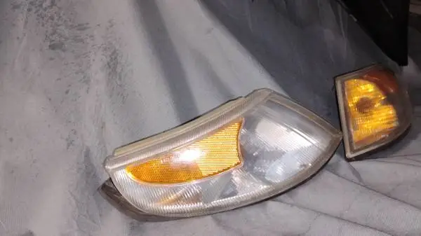 Brand new Saab front bumper headlights