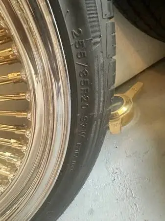 Gold Daytons rims and tires