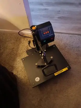 Electric heated t-shirt press