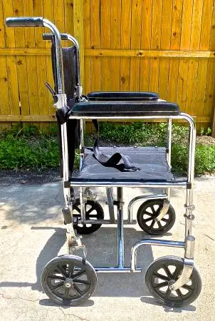 WHEELCHAIR TRANSFER CHAIR IN EXCELLENT CONDITION