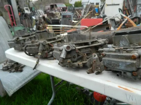 four holly carbs, parts or rebuild