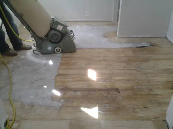 Hardwood floor repairs sanding scratch removal refinishing polishing