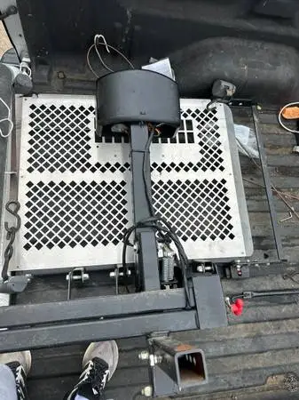 Professional grade Harmar AL100 universal scooter lift.