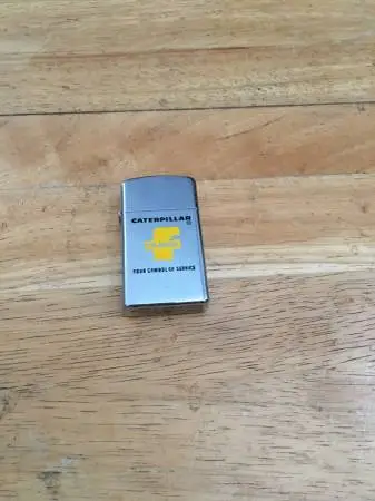 vintage fabick caterpillar zippo lighter