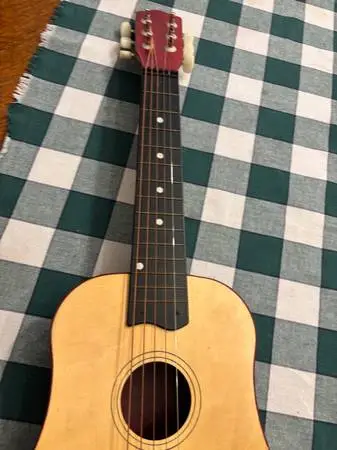 Guitar junior 25 in. Nice wood neck 6 steel string acoustic