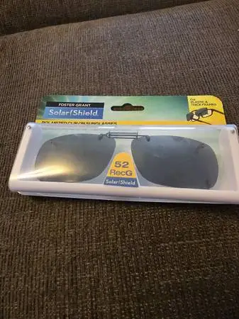 POLAROID SUN GLASS NEW CONDITION