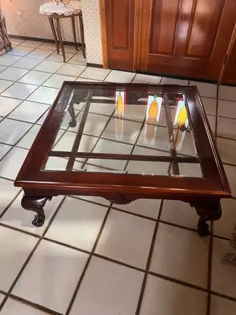 Glass top dark solid wood coffee table