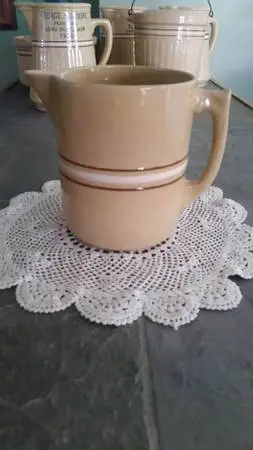 Yelloware pitcher Red Wing/ McCoy??