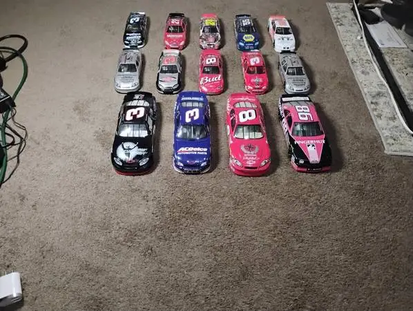 14 Diecast Nascars 1:18 & 1:24 scale it is 8.92 a car