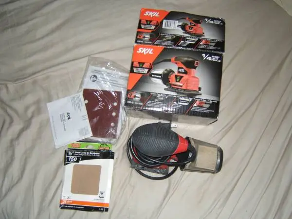 SKIL 7292-02 2.0 Amp 1/4 Sheet Palm Sander with Pressure Control , Red