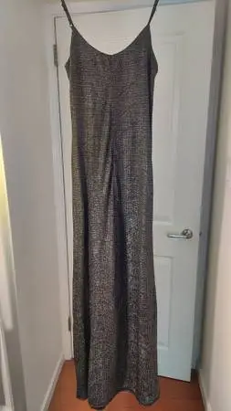 New with tag. BCBG Generation Black & Silver, metallic Dress. SizeXS