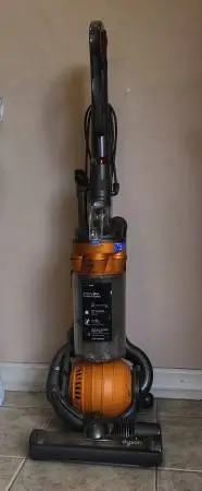 Dyson DC25 is a bagless, upright vacuum cleaner