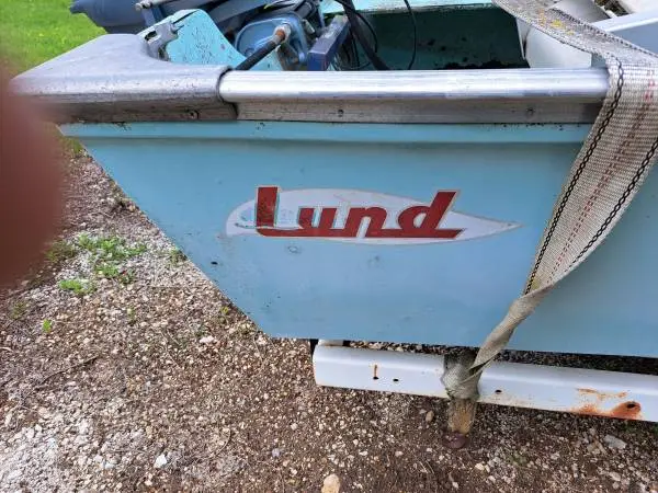 Lund Fiberglass fishing boat 35 hp Evenrude motor