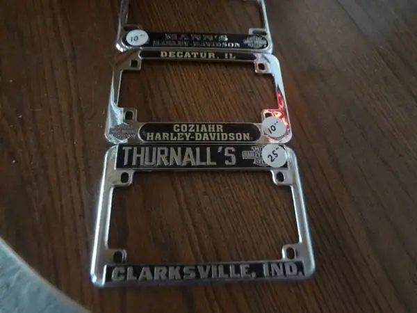 Vintage license plate frames--Manns - Coziahr- Harley Dav