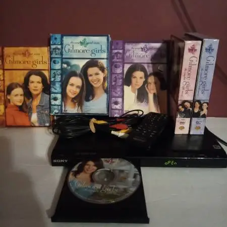 Sony DVD Player, Remote, Batteries, cables And 5 TV Seasons