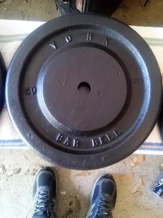 Two Vintage York Wide 50lb Weight Plates