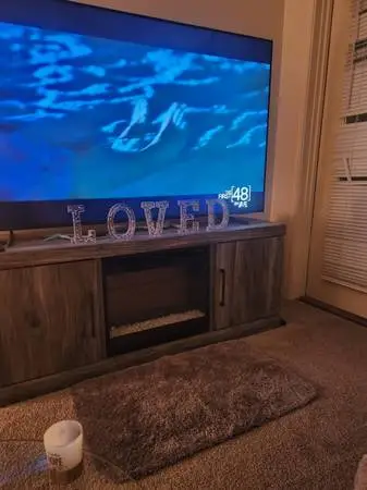 75 in samsung theater and fireplace TV stand